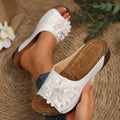 Women's dark brown peep-toe slippers with a fish mouth design and thick rubber sole on a white background.