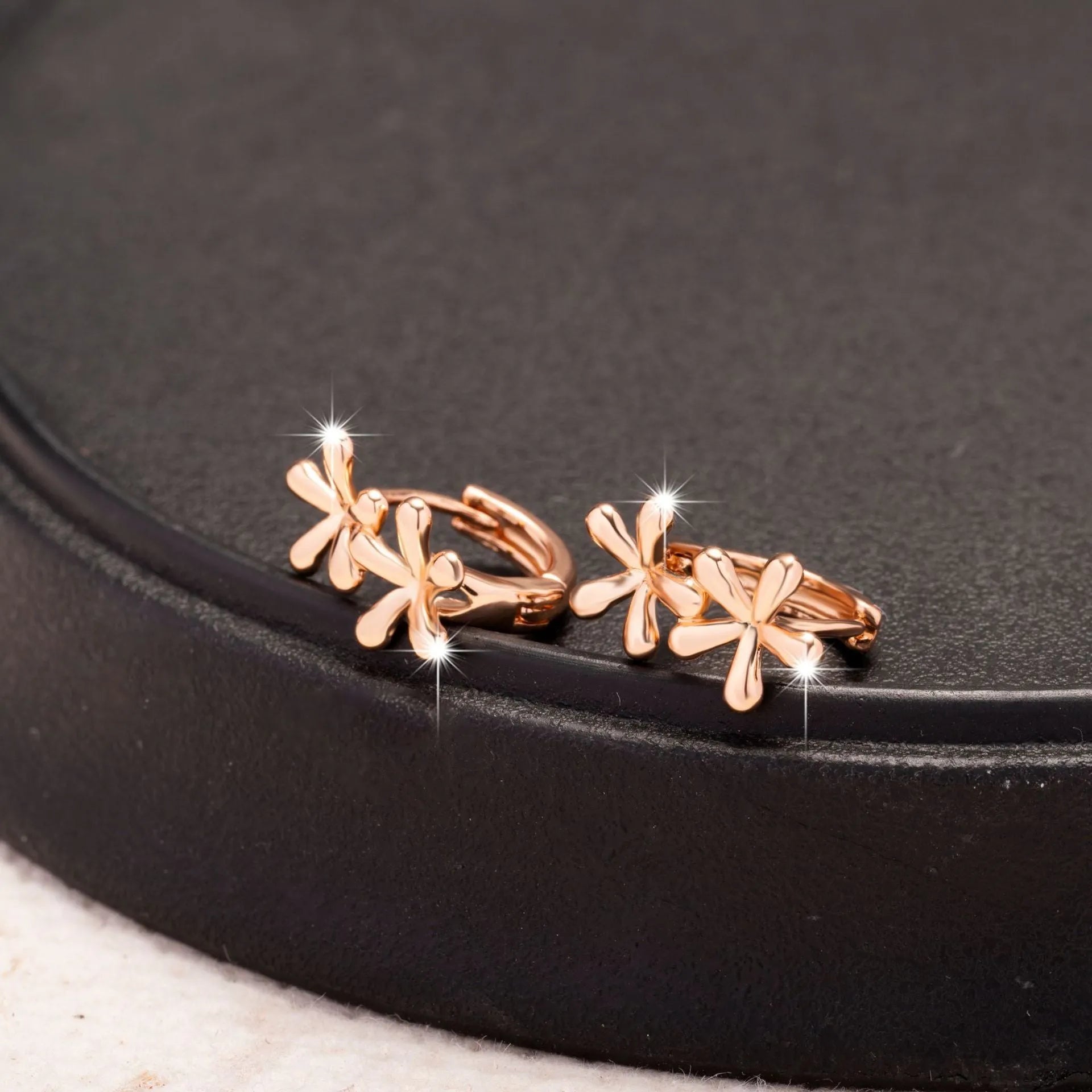 Rose gold electroplated waterdrop flower earrings with circular European style design for women