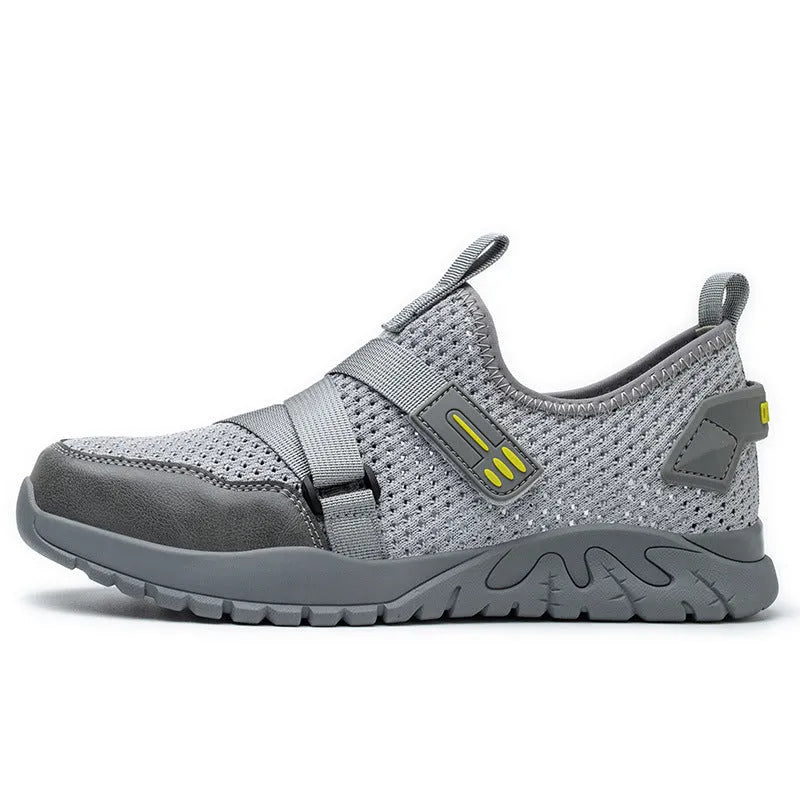 Men's grey anti-smash and anti-puncture work safety shoe with rubber sole.