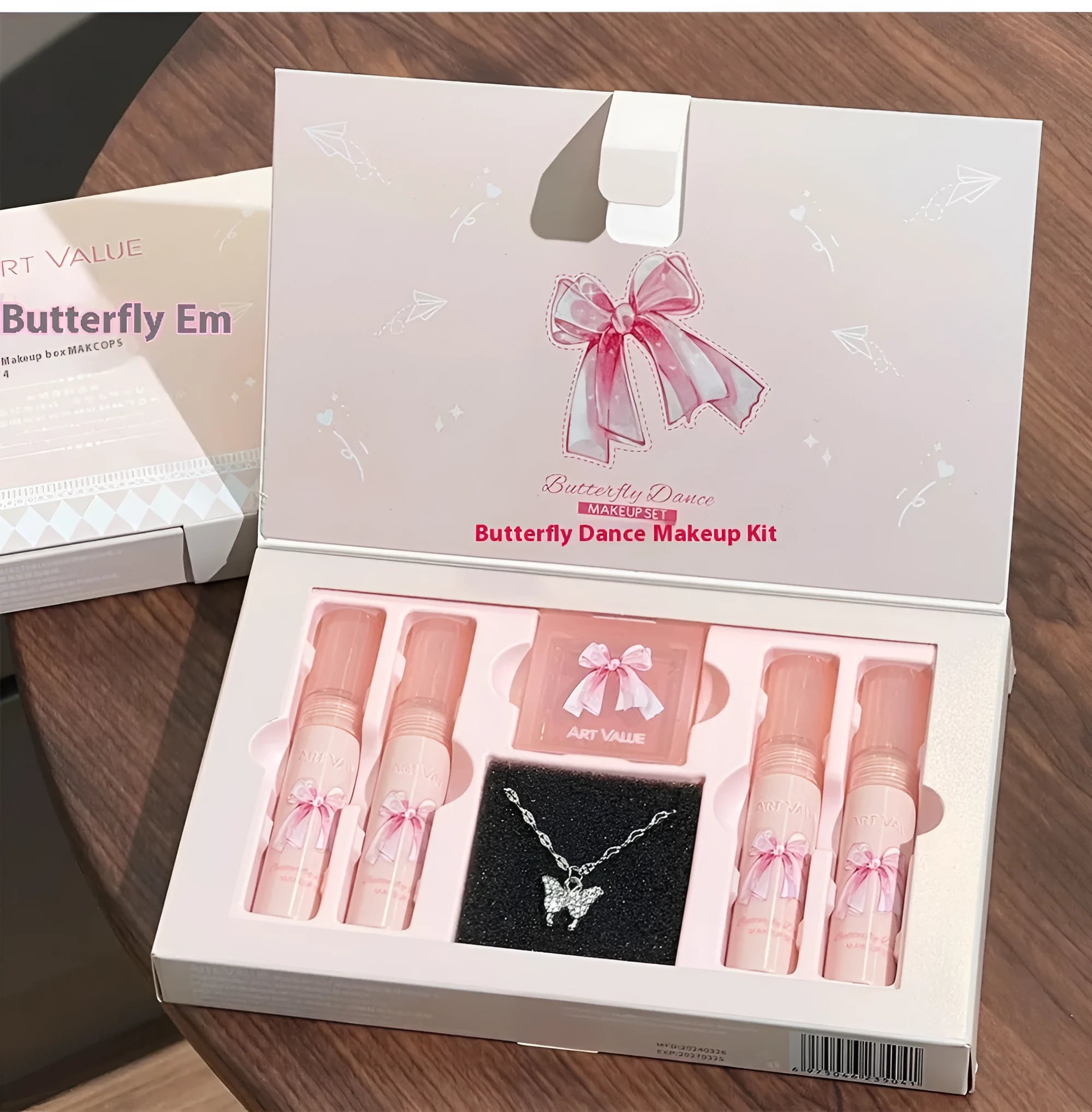 Butterfly Box makeup set with four pink matte lip muds, powder blusher, and matching necklace