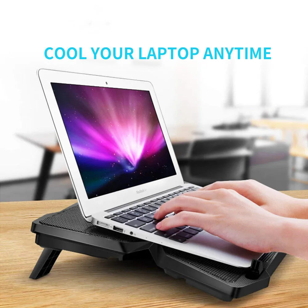 Laptop cooling base with four blue LED fans, speed switches, and USB ports on cooling pad