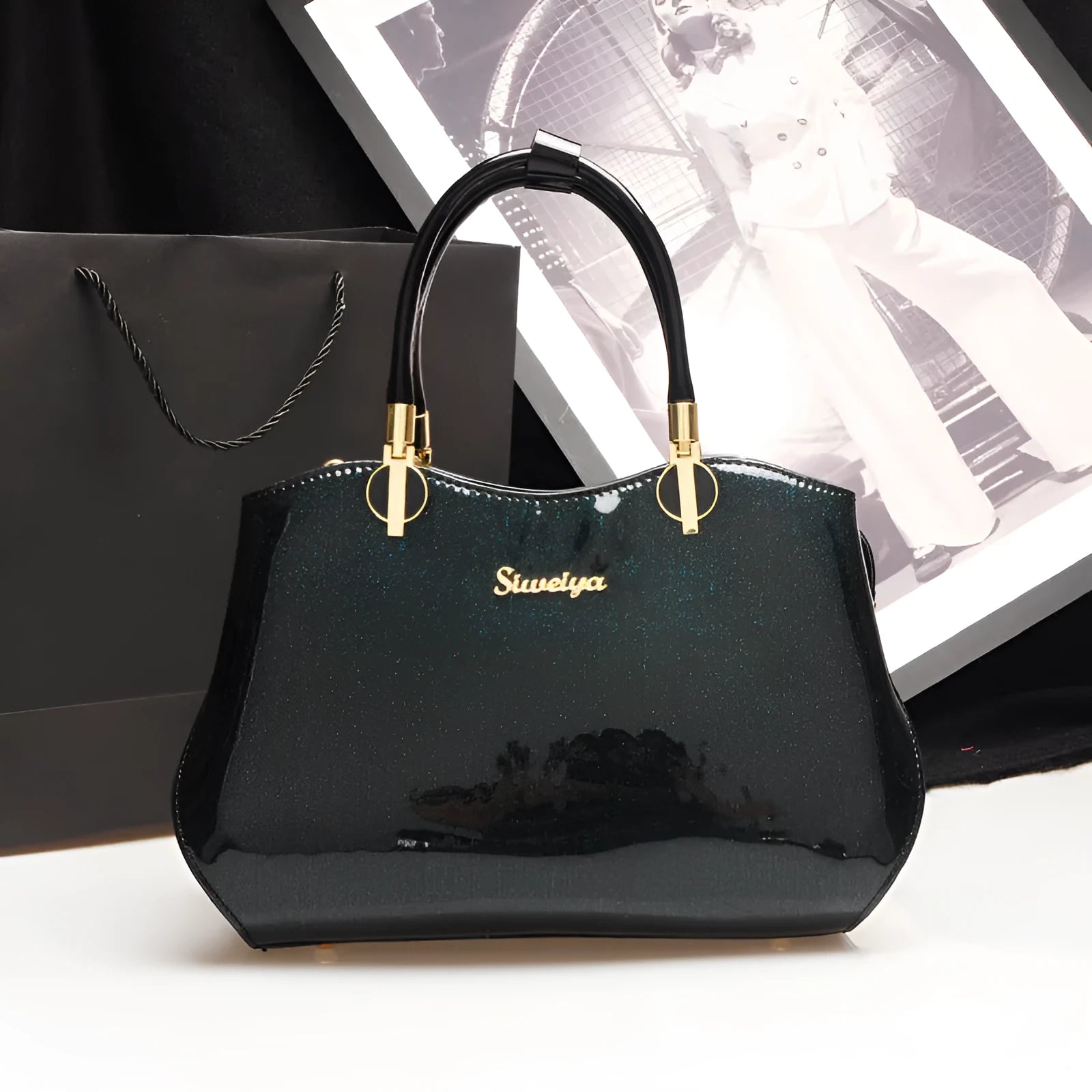 Women's medium horizontal square handbag with zipper closure and printed design, available in multiple colour options