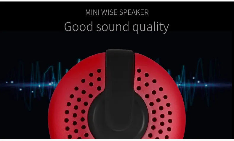 Hieha XQ11 cylinder-shaped mini portable Bluetooth speaker in metallic colour on a table.
