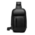 Black PVC outdoor shoulder bag showing medium size, shoulder strap, and internal pocket organisation