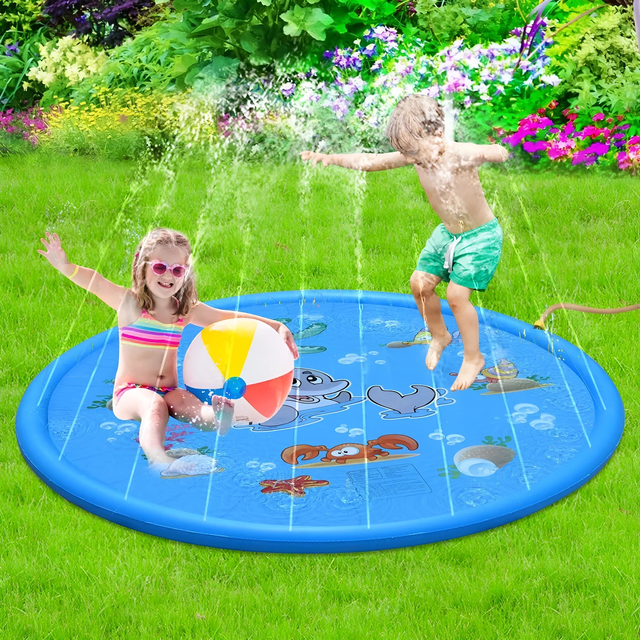 Blue PVC children's water spray play mat with marine animal designs, shown connected to a garden hose