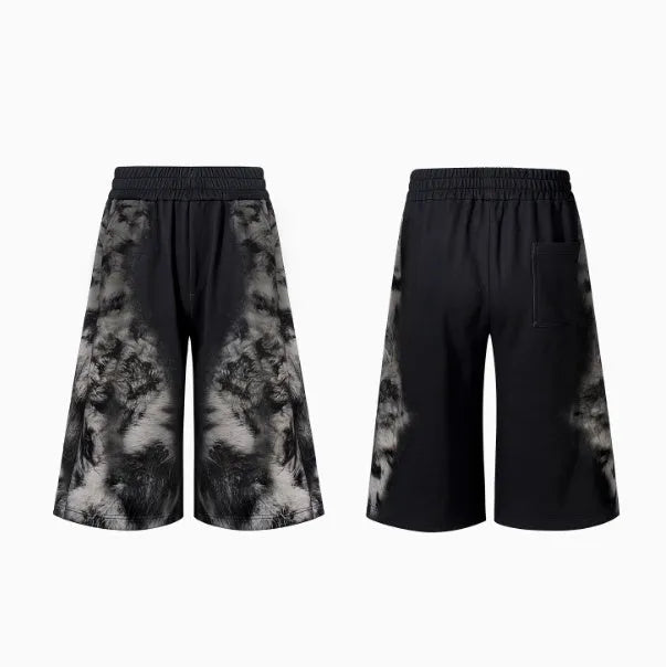 Streetwear set showing trousers, hoodie, and shorts in printed polyester fabric with loose fit design