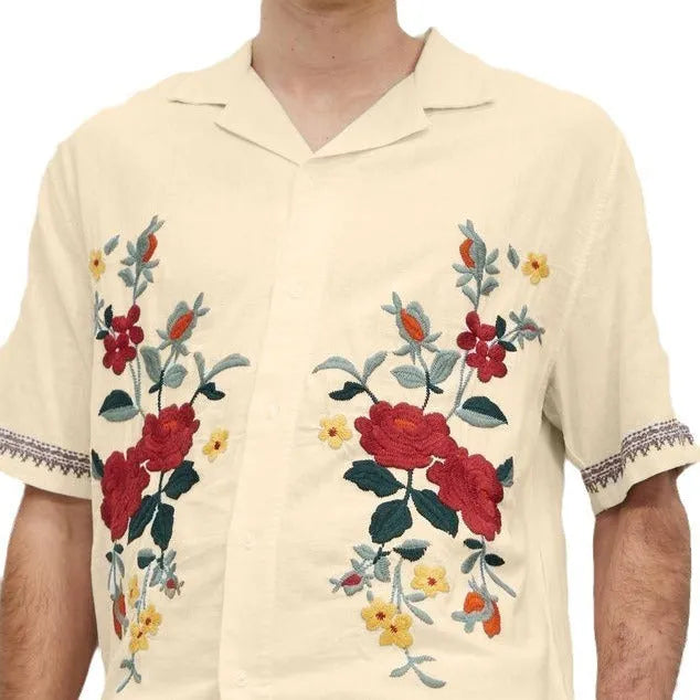 Apricot-coloured men's casual shirt with vintage floral print, short sleeves, and a cardigan-style lapel.