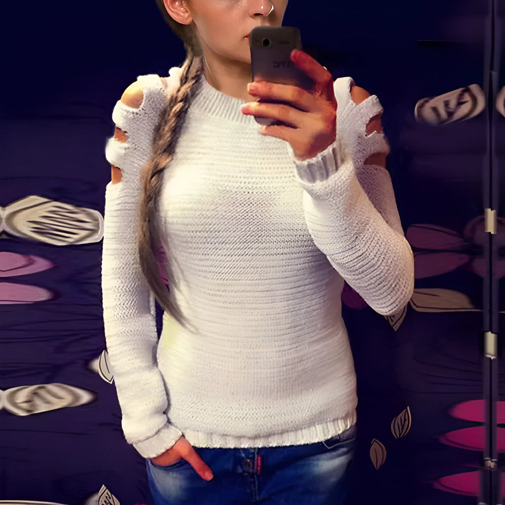 Women's solid colour knitted shirt with crocheted hollow-out long sleeves and round neck.