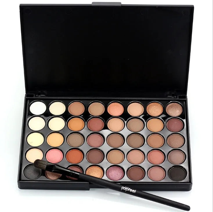 40-colour matte and glitter eyeshadow palette with a brush, showing earth tones and vibrant shades in one case