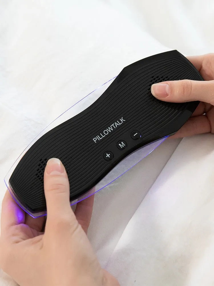 Black wireless in-ear Bluetooth headphones designed for sleep comfort with built-in microphone