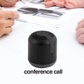 Hieha XQ11 cylinder-shaped mini portable Bluetooth speaker in metallic colour on a table.