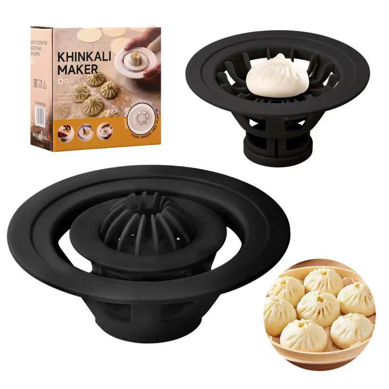 Four black plastic Jinkali steamed bun moulds for shaping baozi.