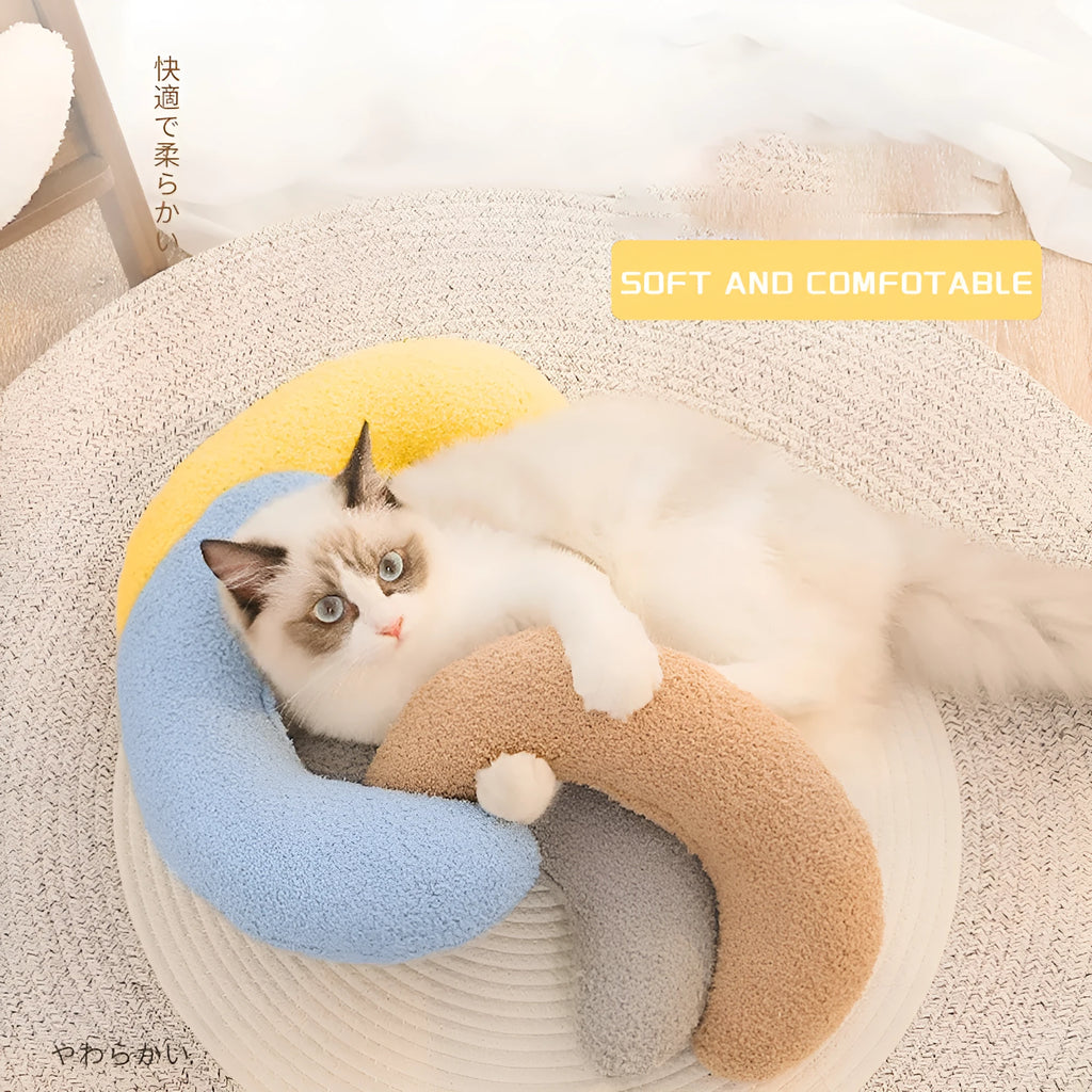U-shaped blue cat pillow with adjustable collar for feline cervical support