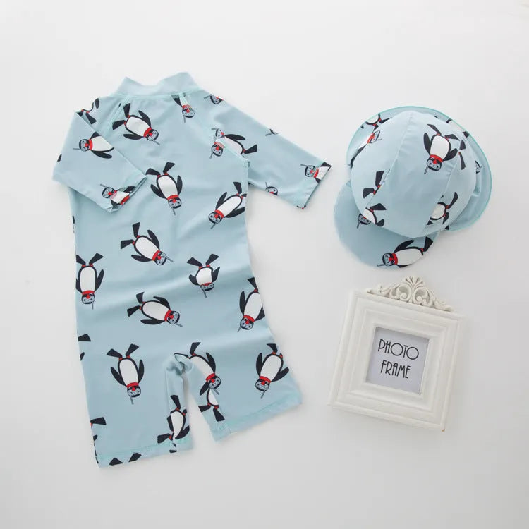 Boys' penguin print long sleeve one-piece swimsuit with matching swimming cap