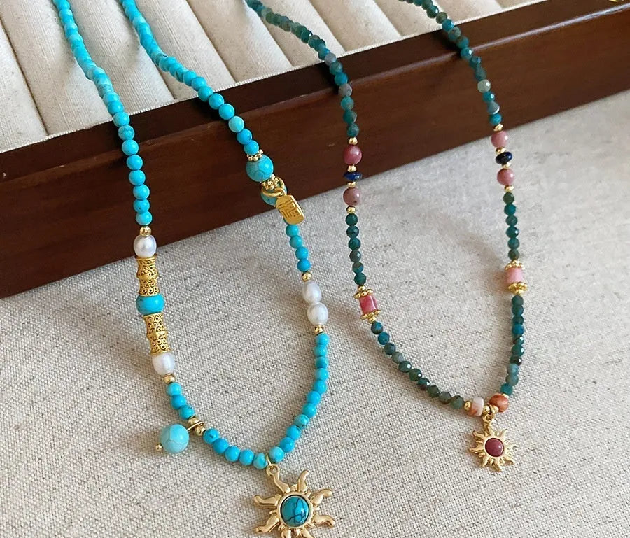 Freshwater pearl necklace with electroplated sun pendant on 41-50 cm clavicle chain