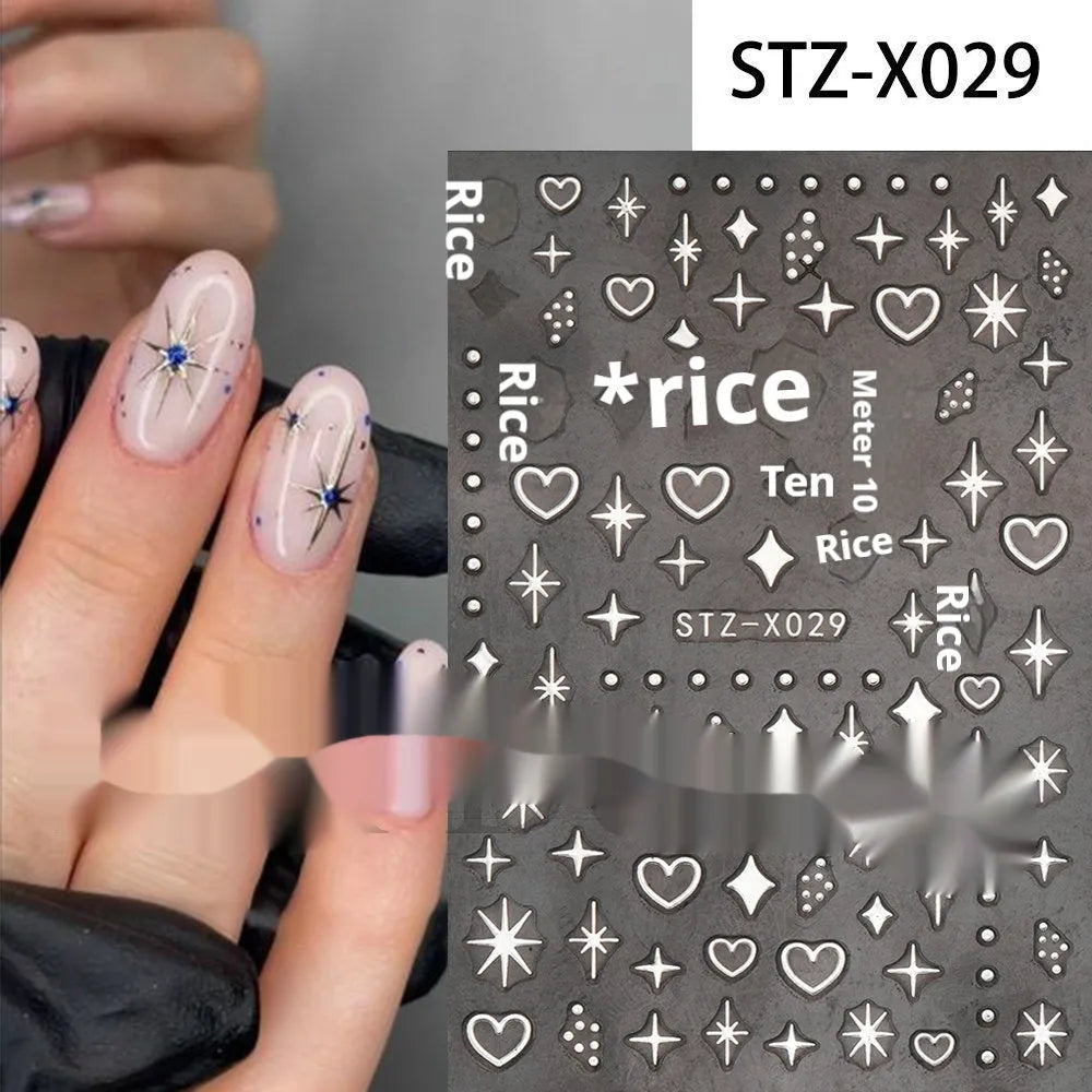 Sheet of black and silver strip nail art stickers with cartoon and love heart designs