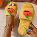 Yellow and white Halloween pumpkin plush open toe slippers with synthetic fur upper and PVC sole