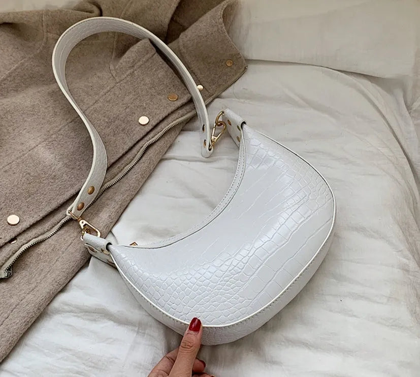 Fairy dumpling bag in PU with crossbody strap, 24cm wide, available in multiple colours