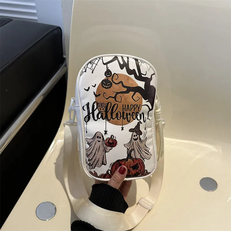 Black Halloween graffiti crossbody bag with pumpkin, ghost, and bat print