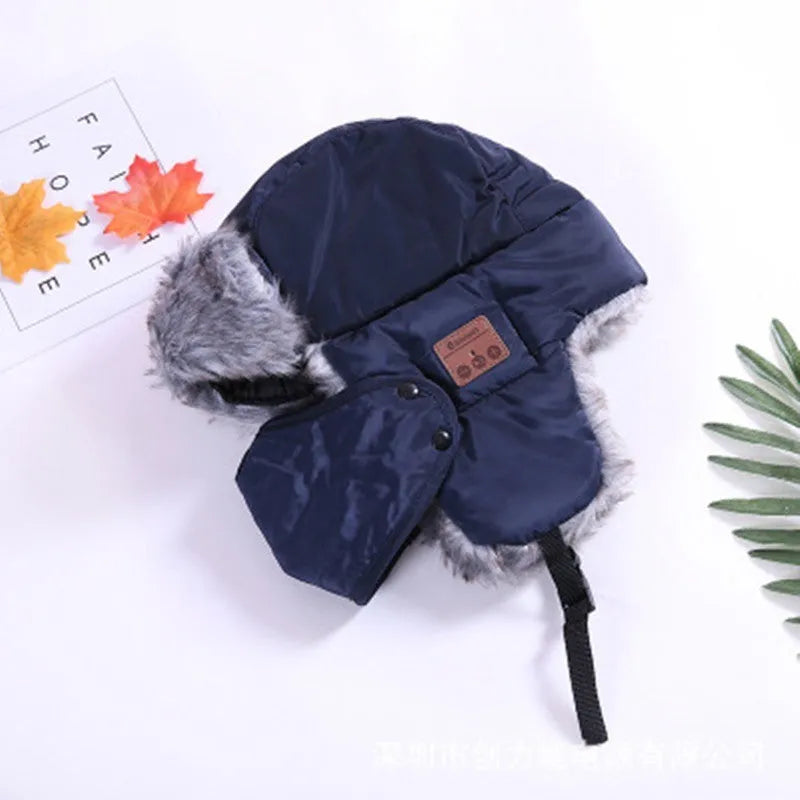 Bluetooth bomber hat in black with acrylic and plush fabric, showing built-in audio controls