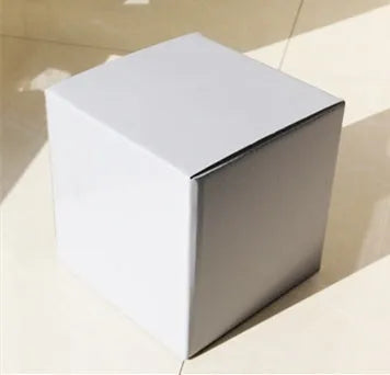 Square black corrugated cardboard packaging box with three internal compartment floors.