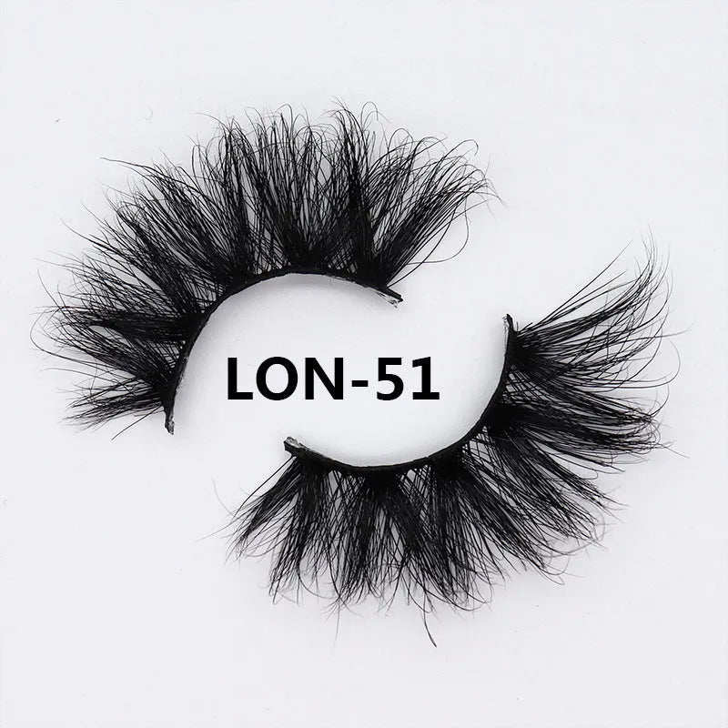 25MM3D handmade mink eyelashes in a clear plastic tray showing 25mm length 3D curl design