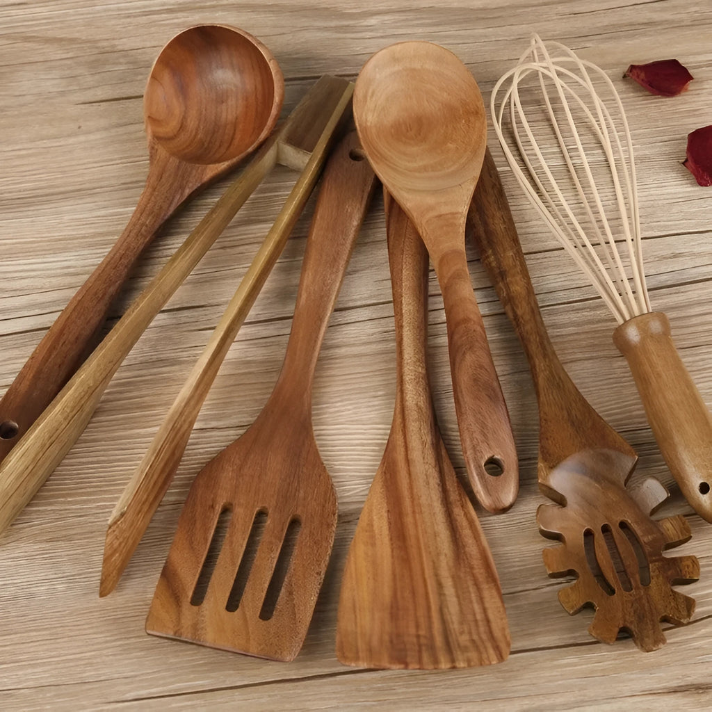 Seven wooden cooking utensils with non-slip handles designed for non-stick pans