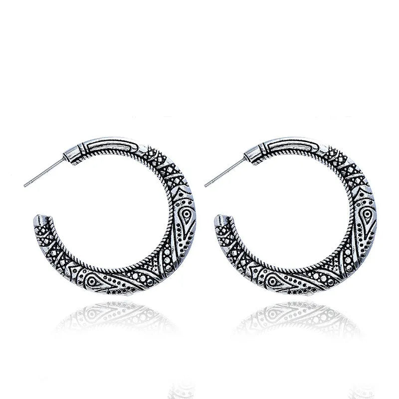 Bronze C-shaped alloy earrings with vintage engraving pattern, curved silhouette