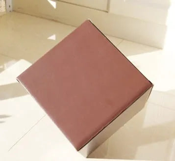 Square black corrugated cardboard packaging box with three internal compartment floors.
