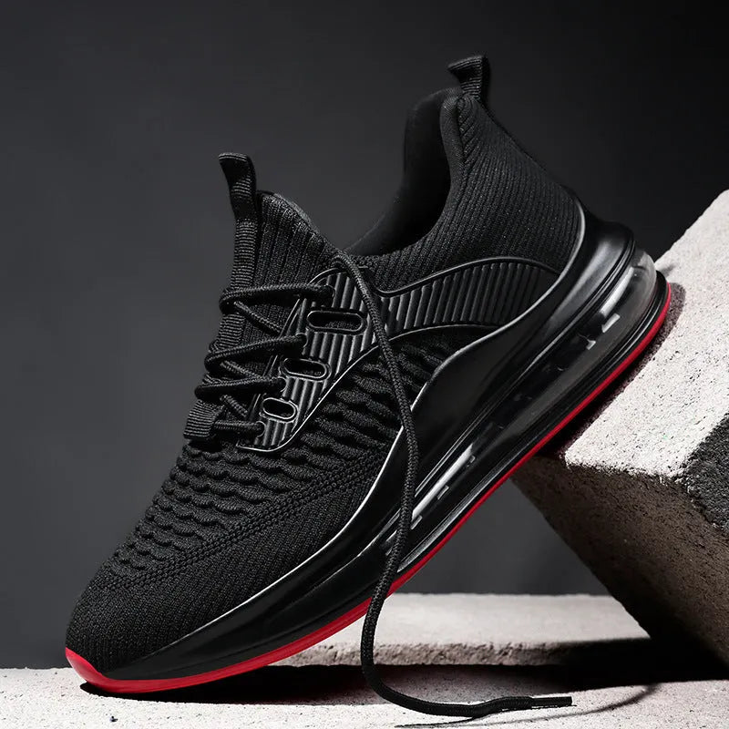 Men's black mesh running shoes with platform sole and lace-up closure