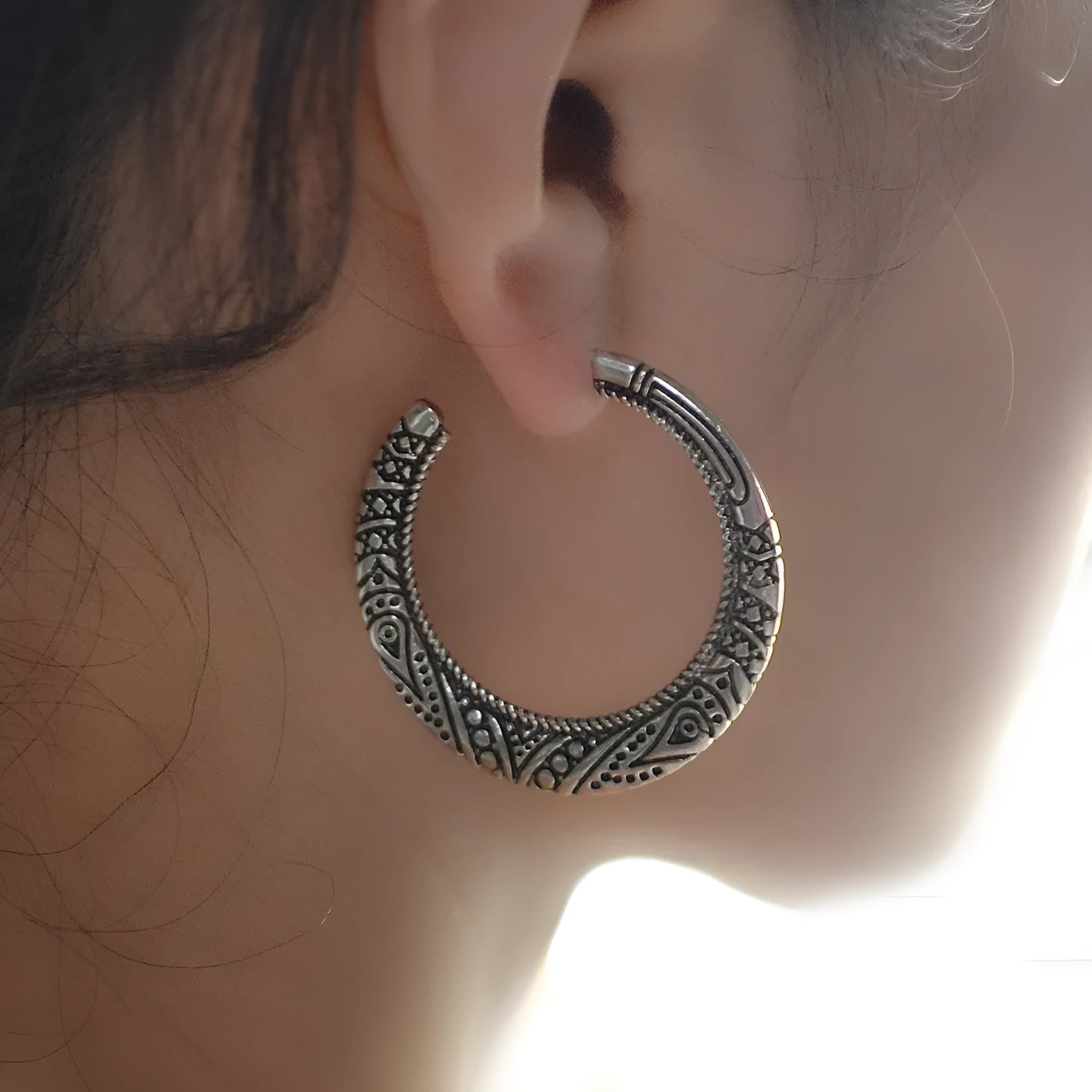 Bronze C-shaped alloy earrings with vintage engraving pattern, curved silhouette