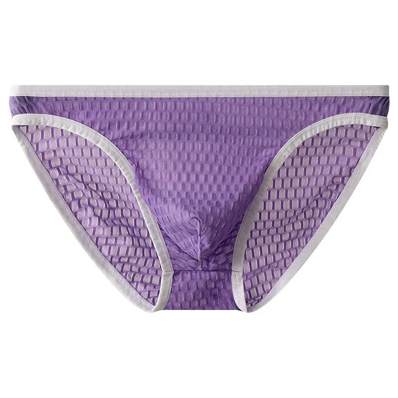 Men's low waist transparent lace underwear shorts in a solid colour on a neutral background.