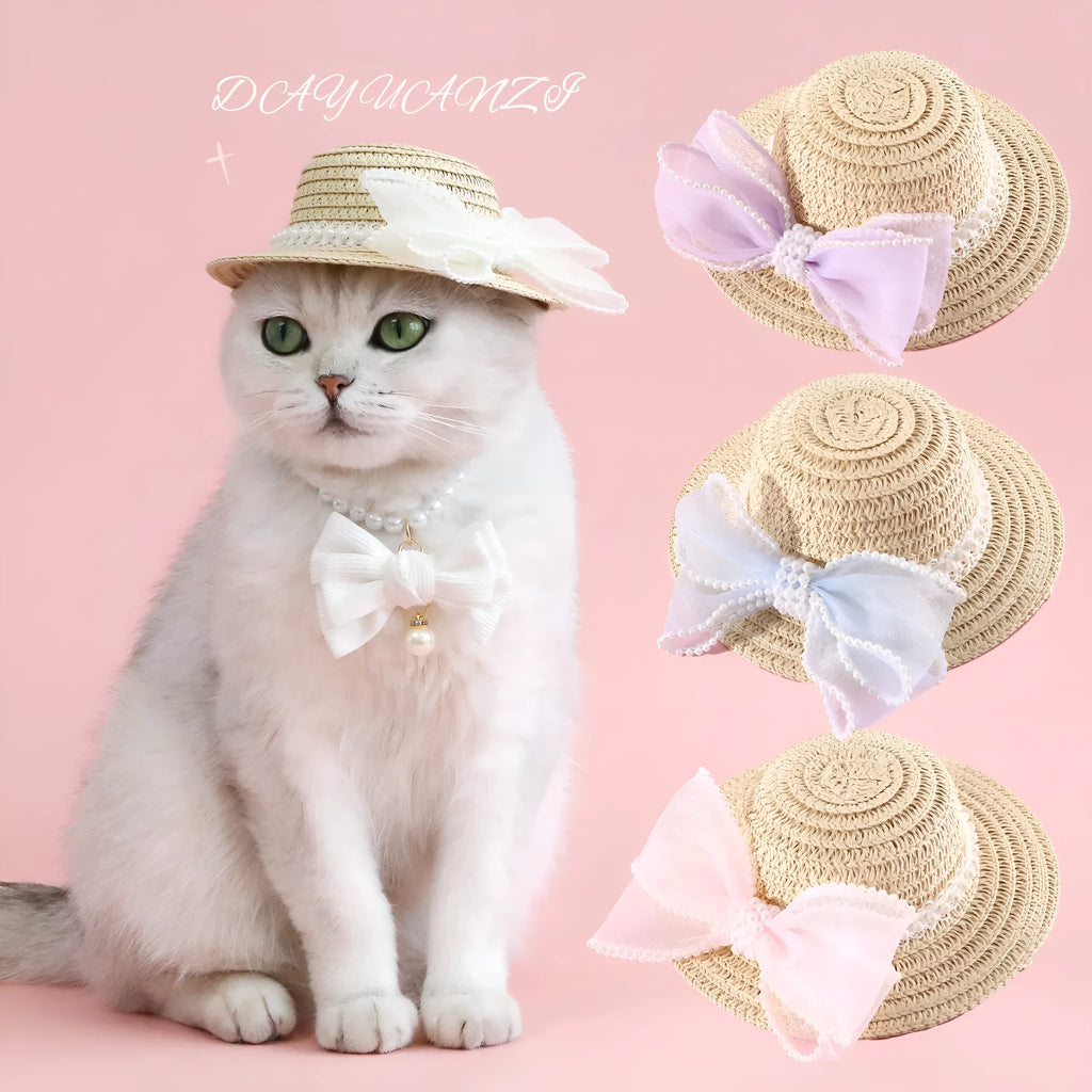 Cat wearing a woven straw hat with a pearl bow decoration in a princess style.