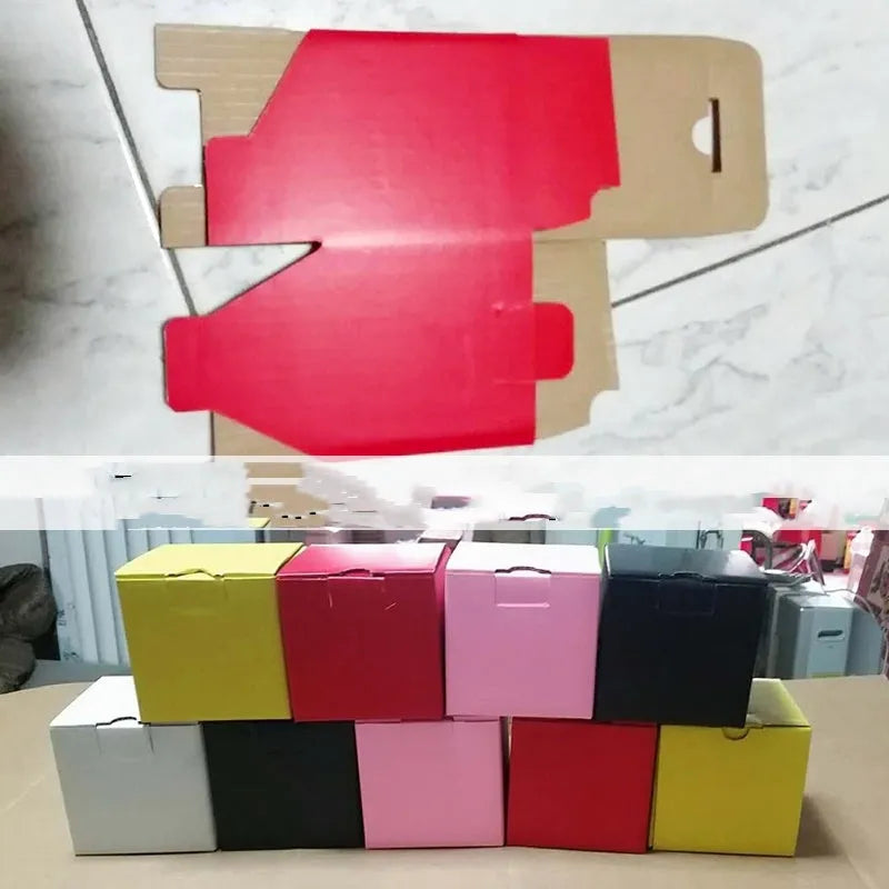 Square black corrugated cardboard packaging box with three internal compartment floors.