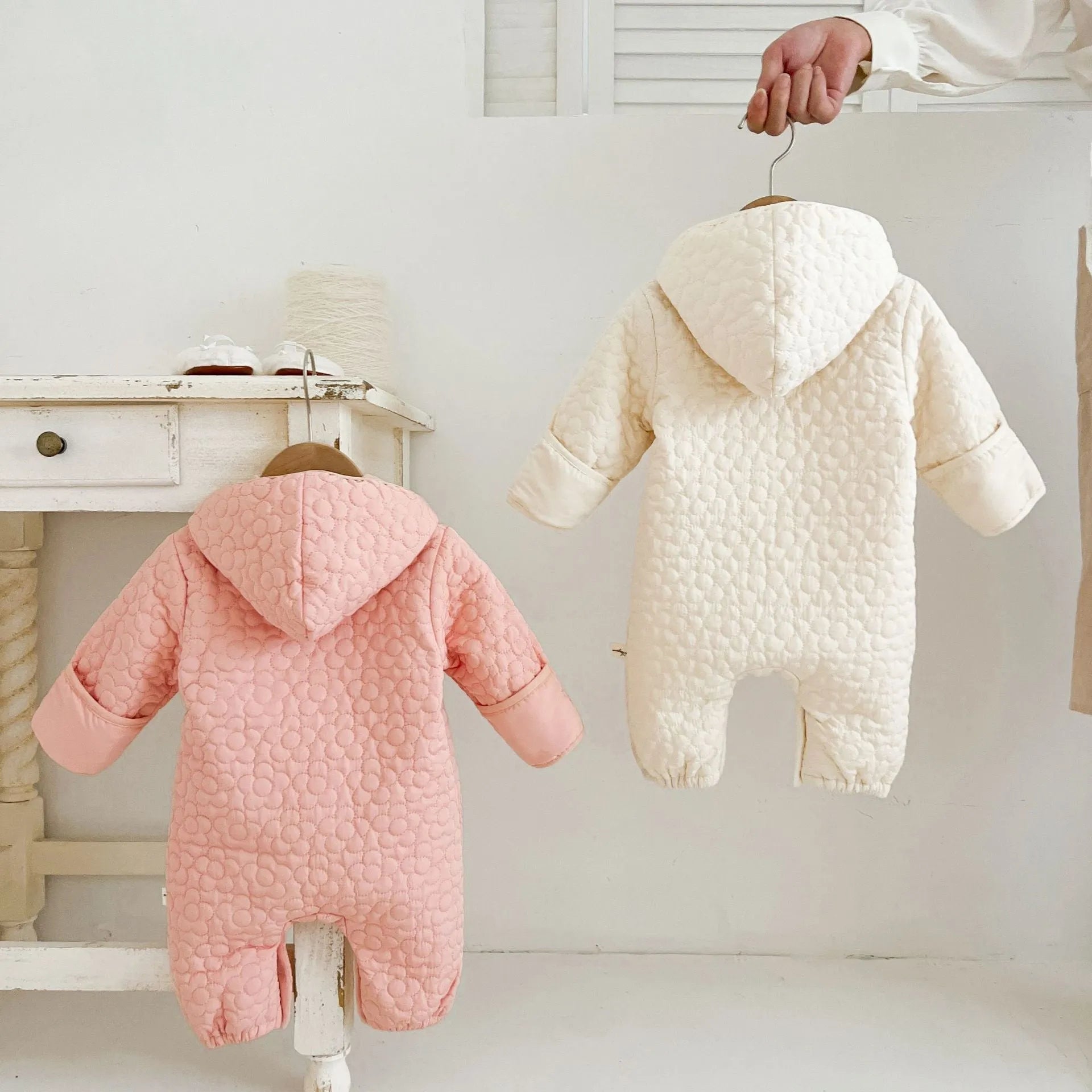 Baby cotton quilted romper with hood in beige, long sleeves, zip-up front