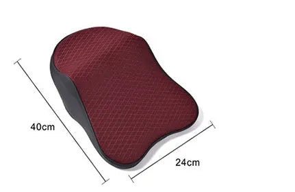 Memory foam car neck pillow with ergonomic shape, adjustable strap, and polyester cover on a car seat