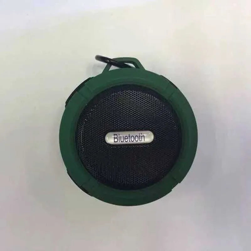 Portable waterproof Bluetooth speaker in multiple colours with bag clip for outdoor use