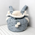 Blue winter pet carrier backpack made of plush flannel for outdoor travel with small cats and dogs