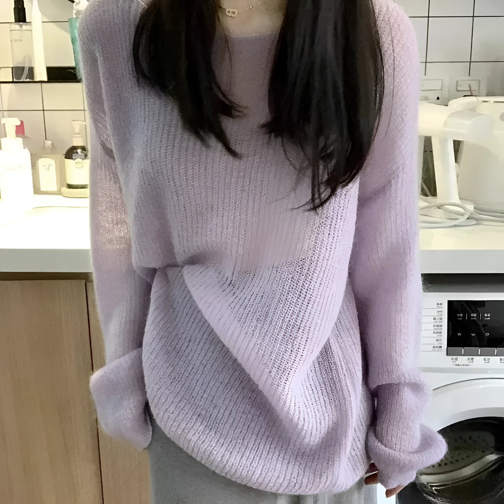Purple sleeveless blouse with princess sleeves and hollow-out detail, made from lightweight ice silk fabric.