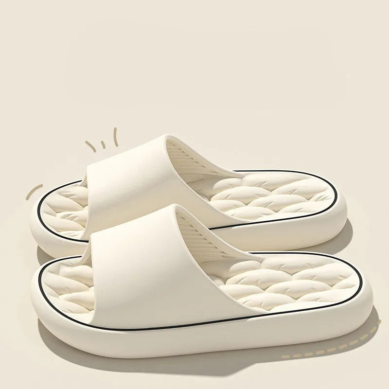 Non-slip EVA bathroom slippers with thick sole and hollow upper in grey, side view