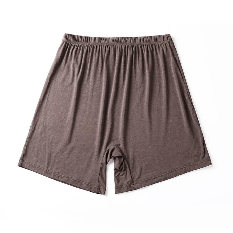 Modal fabric men's high-waisted boxer shorts in solid colours on a white background