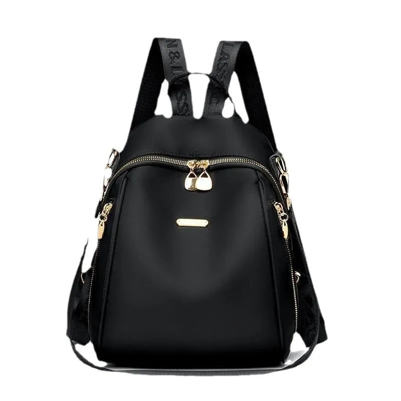 Women's Oxford cloth casual travel backpack in urban simplicity style with sewing line detail and sandwich pocket