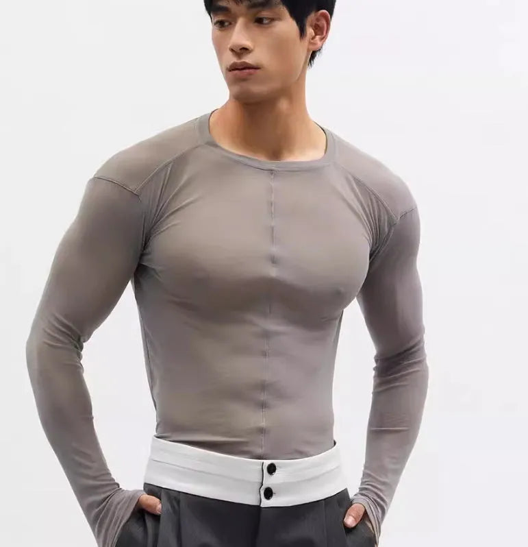 Black mesh see-through texture slim-fit long sleeve pullover on a hanger.