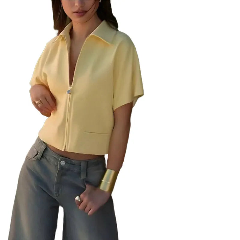 Casual polyester outerwear top in loose fit with short sleeves available in black, white or yellow colours