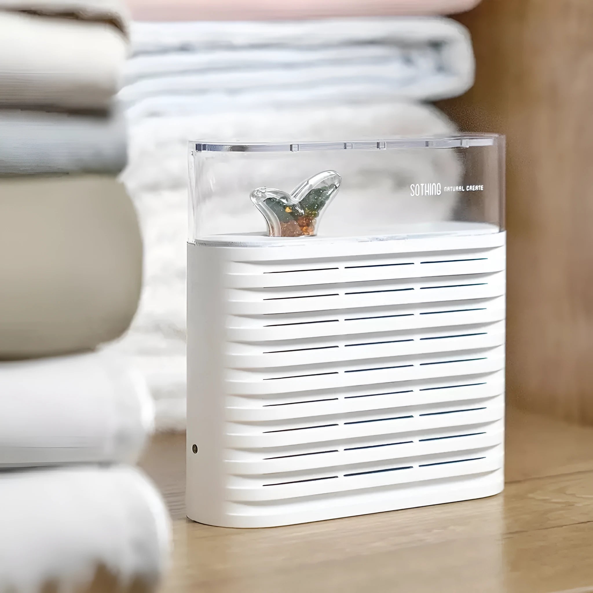 White reusable cabinet dehumidifier box with transparent top showing colour-change indicator