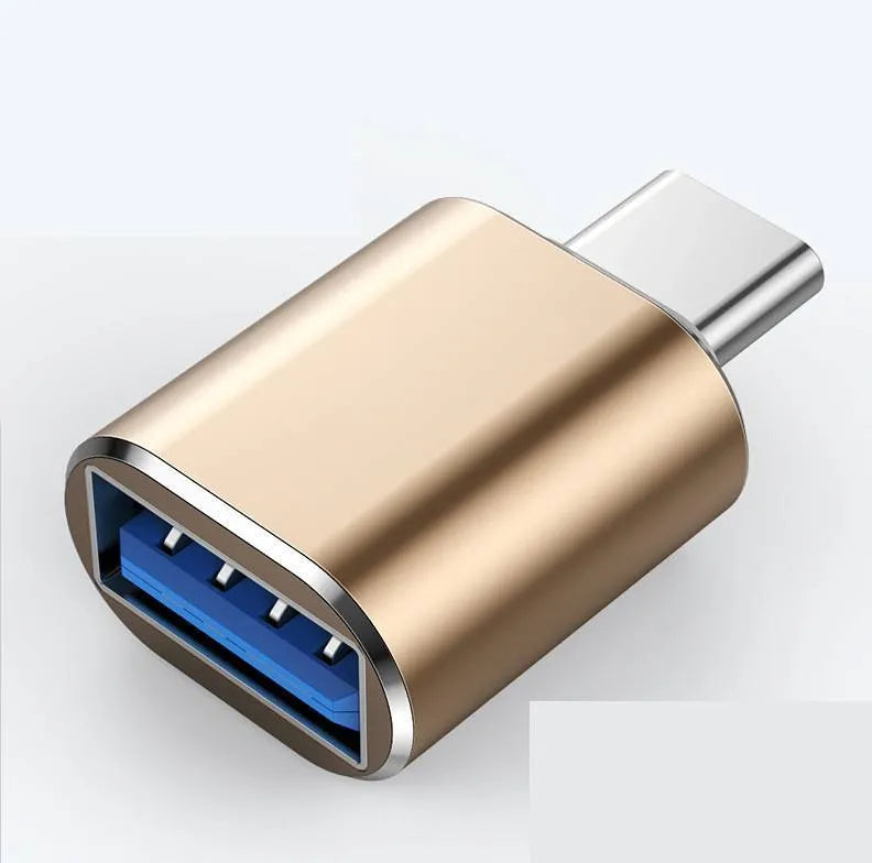 USB-C to USB-A OTG adapter shown in black, gold, and silver colour options.