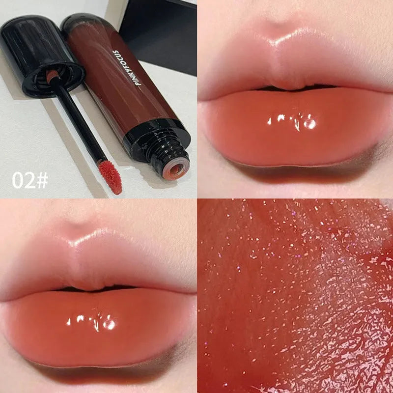 Black shiny makeup mirror lip lacquer tube showing one of six Black Citrus colour options