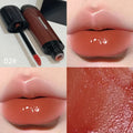 Black shiny makeup mirror lip lacquer tube showing one of six Black Citrus colour options