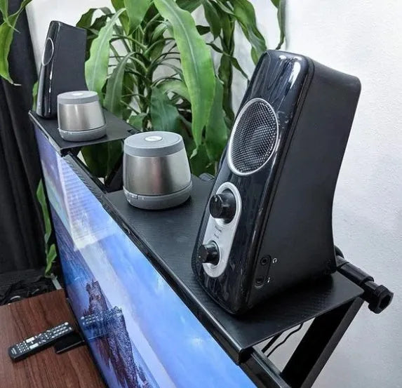 Adjustable black screen top shelf compatible with Apple TV and Roku, 13-inch size, on a computer monitor