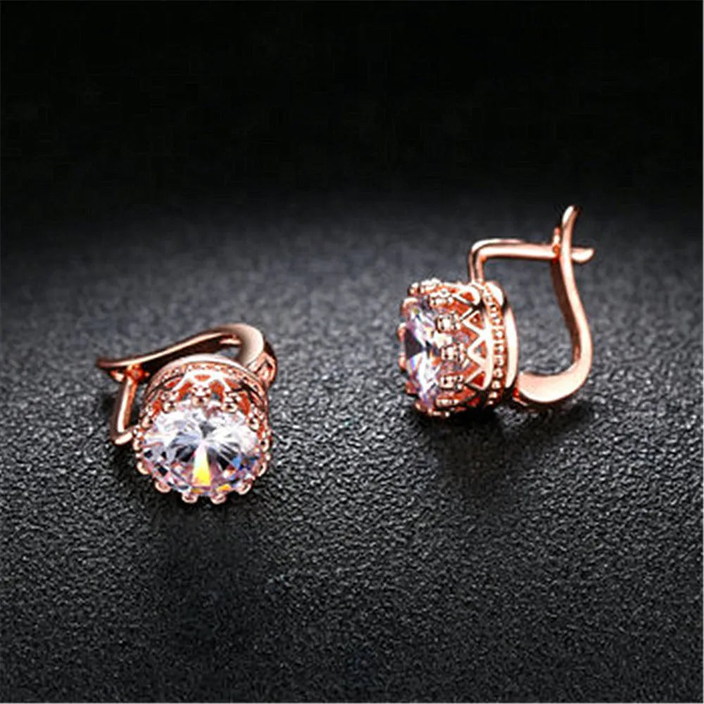 Korean retro crown-shaped clip earrings with white diamond details in rose gold colour